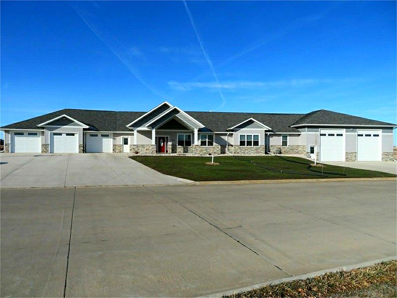 Wide single-story home with garages on both ends
